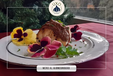 Mero coronado con Ajo Negro