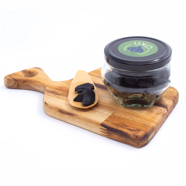 4-3 Esencial Dientes de ajo negro tipo gomita 140gr en frasco diamante y caja regalo (Medium)