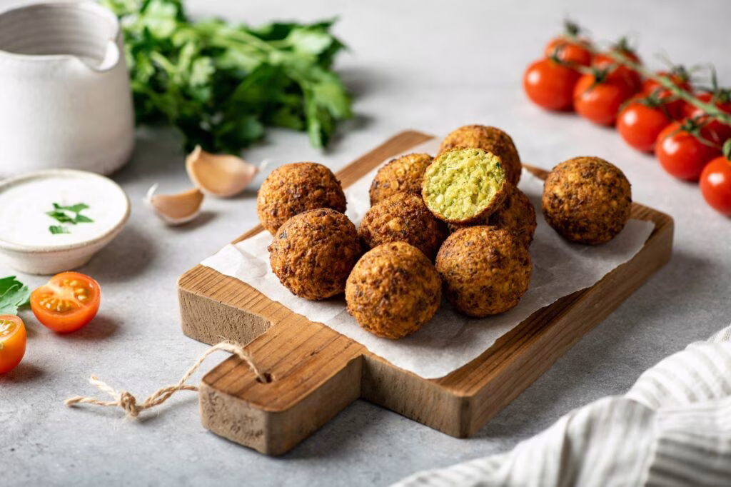 falafel balls on a wooden board